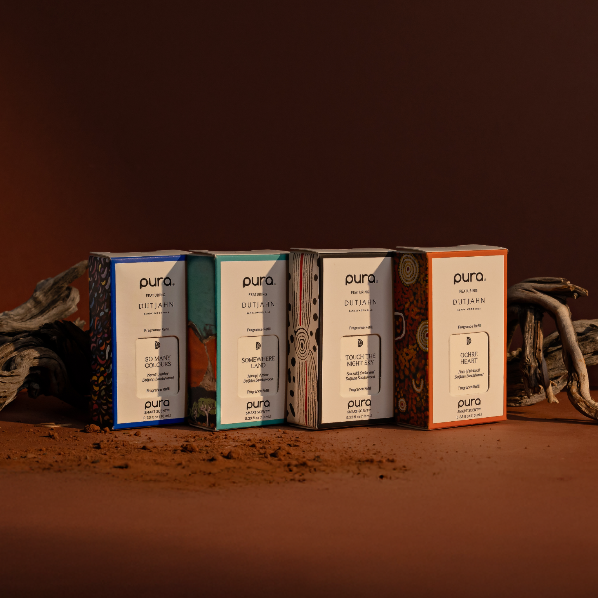 Four Pura x Dutjahn fragrances on a dark background