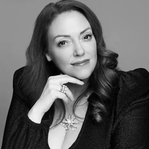 Nicole Eckels, founder of Glasshouse Fragrances, in a black-and-white portrait.